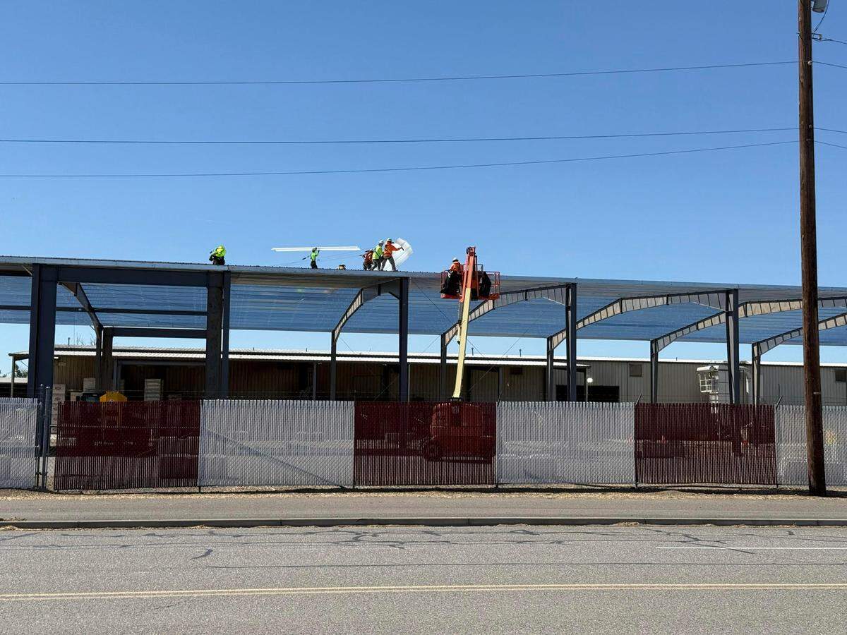 Zen-Noh Hay Inc. is replacing a storage building that burned at its hay facilities in east Pasco.