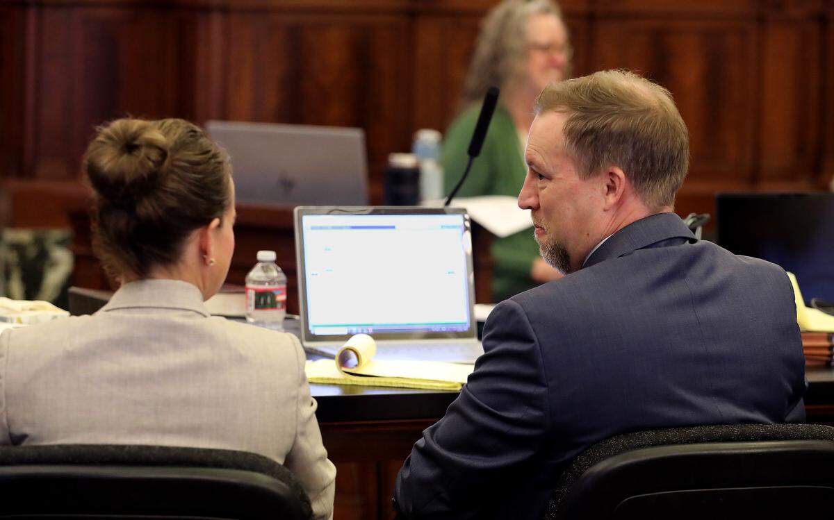 Pasco Police Detective Julie Lee, left, and  Deputy Prosecutor Erek Puccio are part of the prosecution team at the murder trial for Joshua D. Davis in Pasco. 
