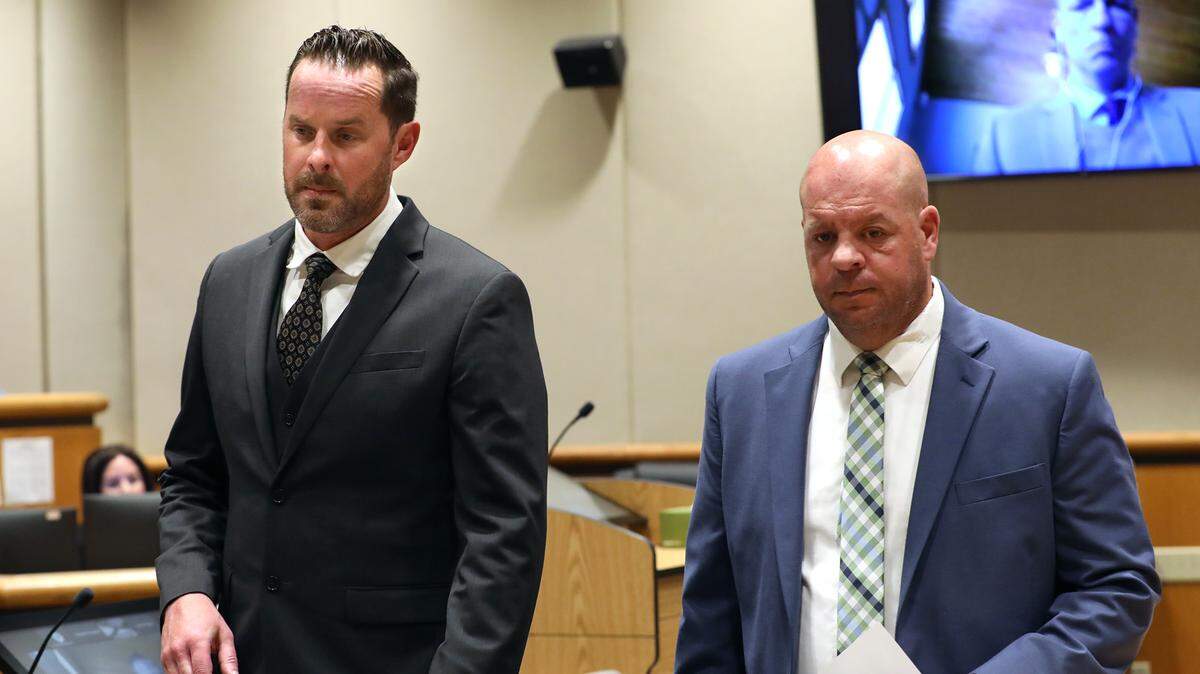 Benton County Commissioner Will McKay, left, leaves a Benton County Superior Courtroom Monday afternoon with his defense attorney Nicholas Jones. McKay, is facing a possible felony theft charge, following an alleged road rage incident where he's accused of taking a cell phone and deleting a video recording. 
