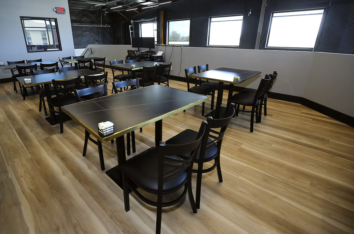Carmen and Angel Peña’s new location features an open space upper level overlooking the main floor.