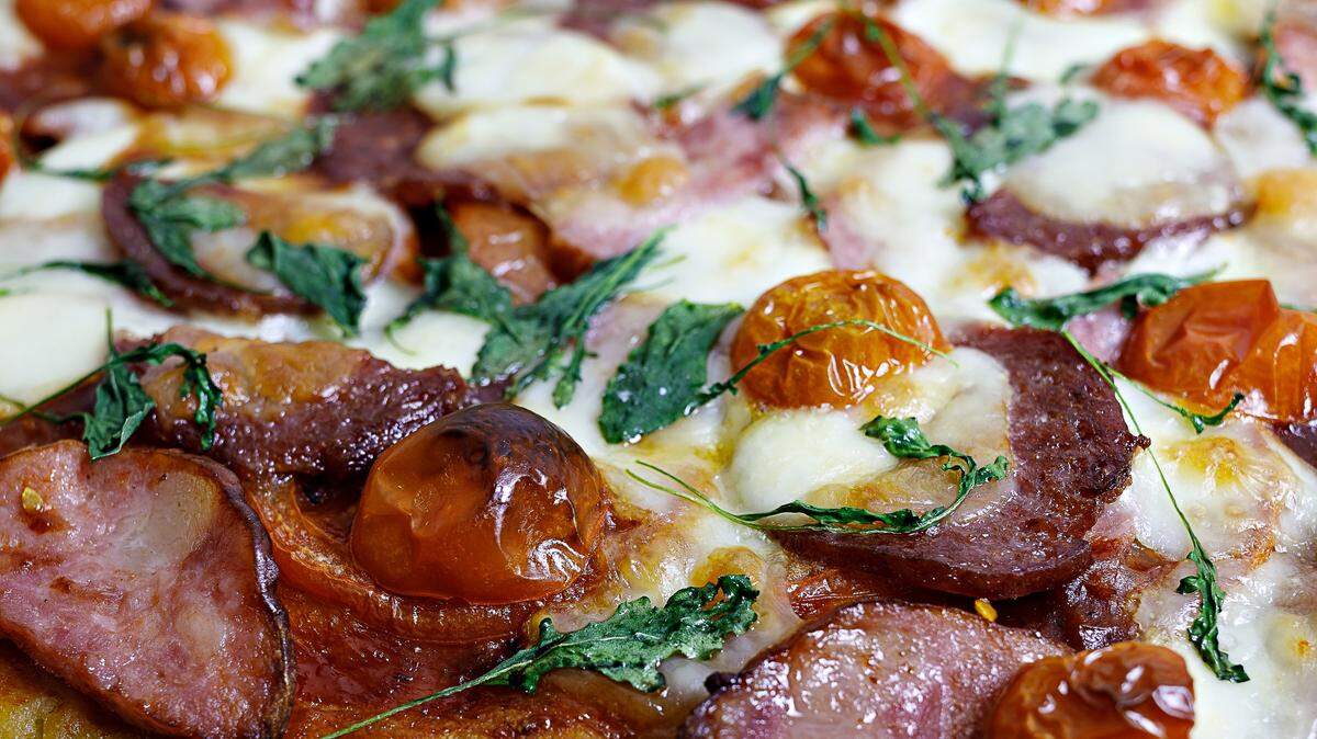 selective focus of delicious freshly baked homemade pizza