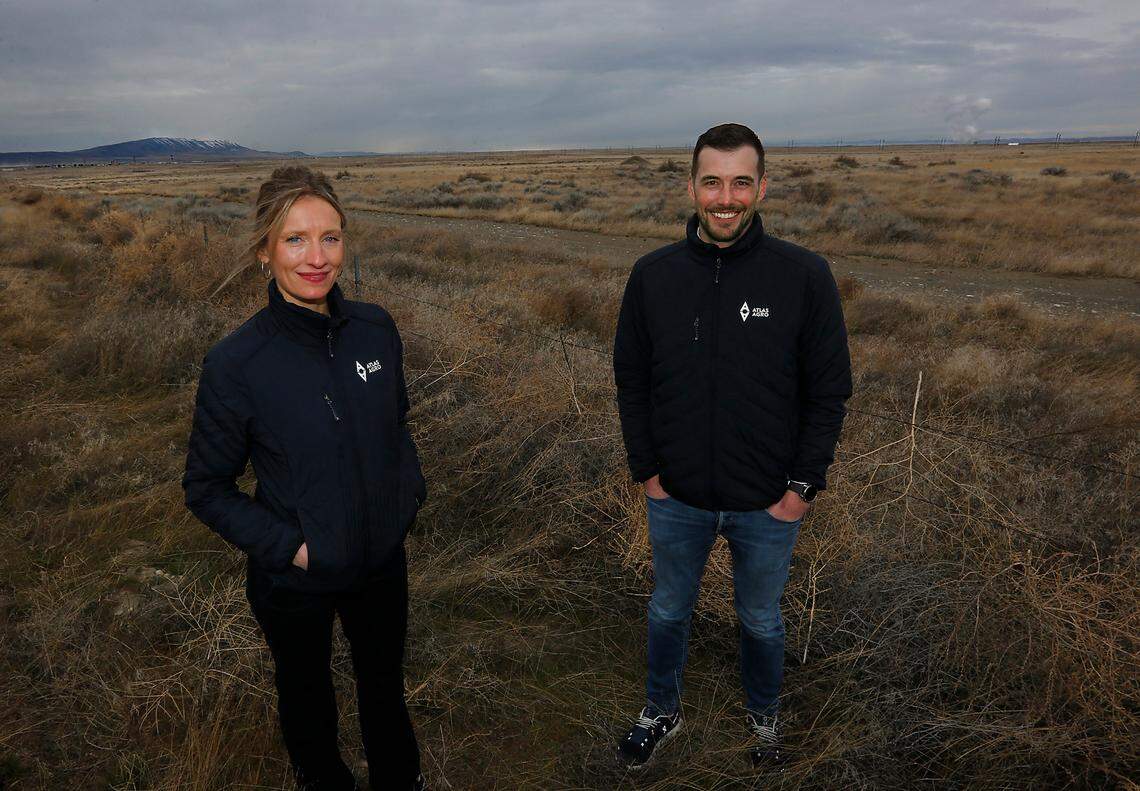 Gina Zejdlik, Atlas Agro director of policy and government relations, and Dan Holmes, Atlas Agro North America executive director, stand in March 2023 on Richland land where it wants to build the first-ever carbon-free fertilizer production plant.