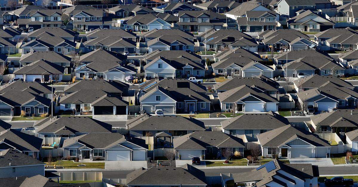 Rows of homes line streets in a housing development off Chapel Hills Boulevard in west Pasco.