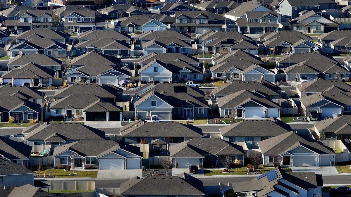 Rows of homes line streets in a housing development off Chapel Hills Boulevard in west Pasco.