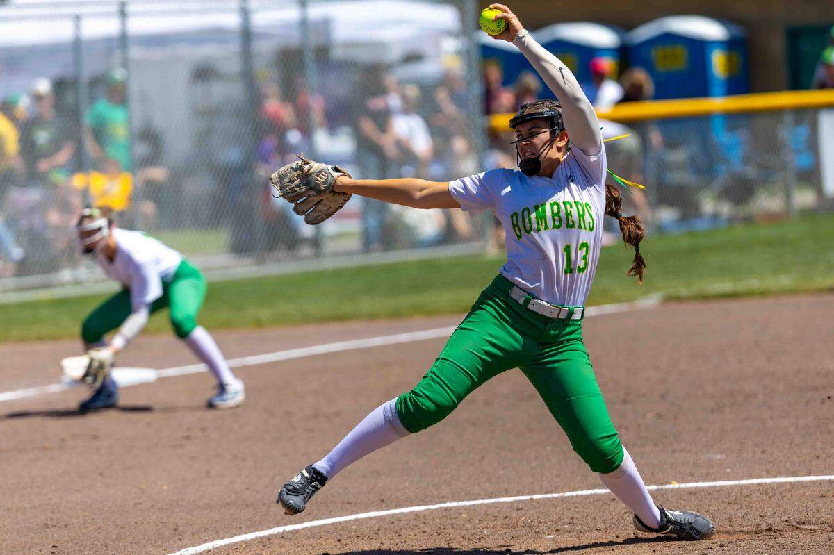 Richland sophomore pitcher Ali Evans, No. 13, delivers against the Eastmont Wildcats during the opening round of the 4A State Fastpitch Softball Championships on Friday in Richland. Richland defeated Eastmont 21-0 to advance in the state tournament.