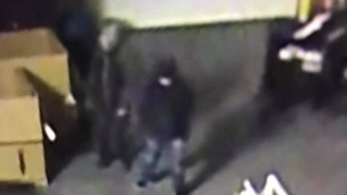 Two people were caught on camera after breaking into Goodwill on Columbia Center Boulevard.