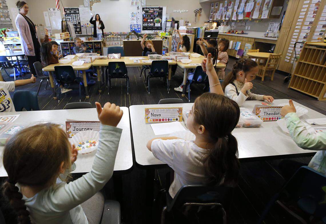 Students answer a question from Transitional Kindergarten teacher Millea DeAngelo recently at Keene-Riverview Elmentary School in Prosser. 