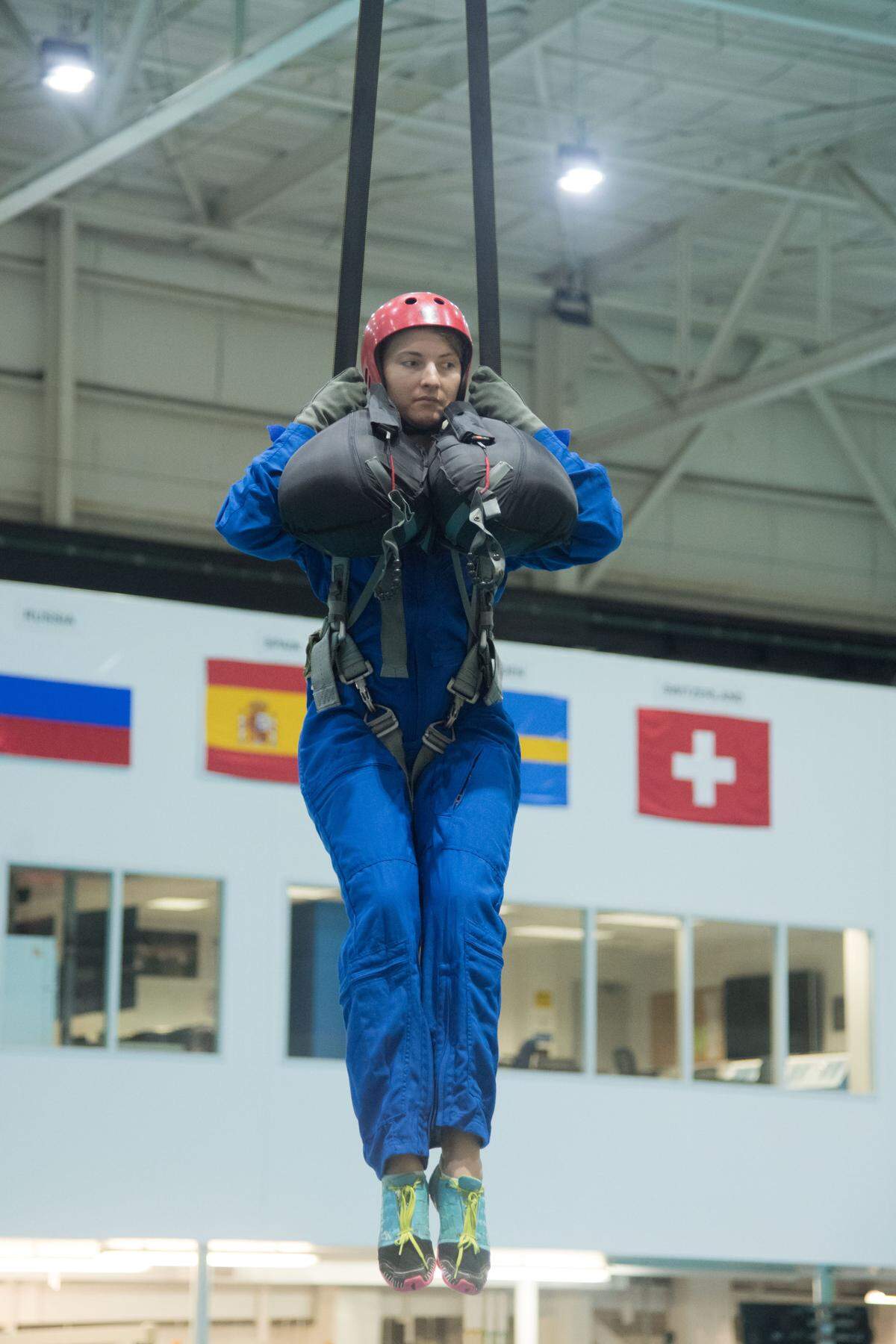 NASA astronaut Kayla Barron awaits next steps by instructors during water survival training as an astronaut candidate at NASA Johnson Space Center’s Neutral Buoyancy Laboratory in Houston.