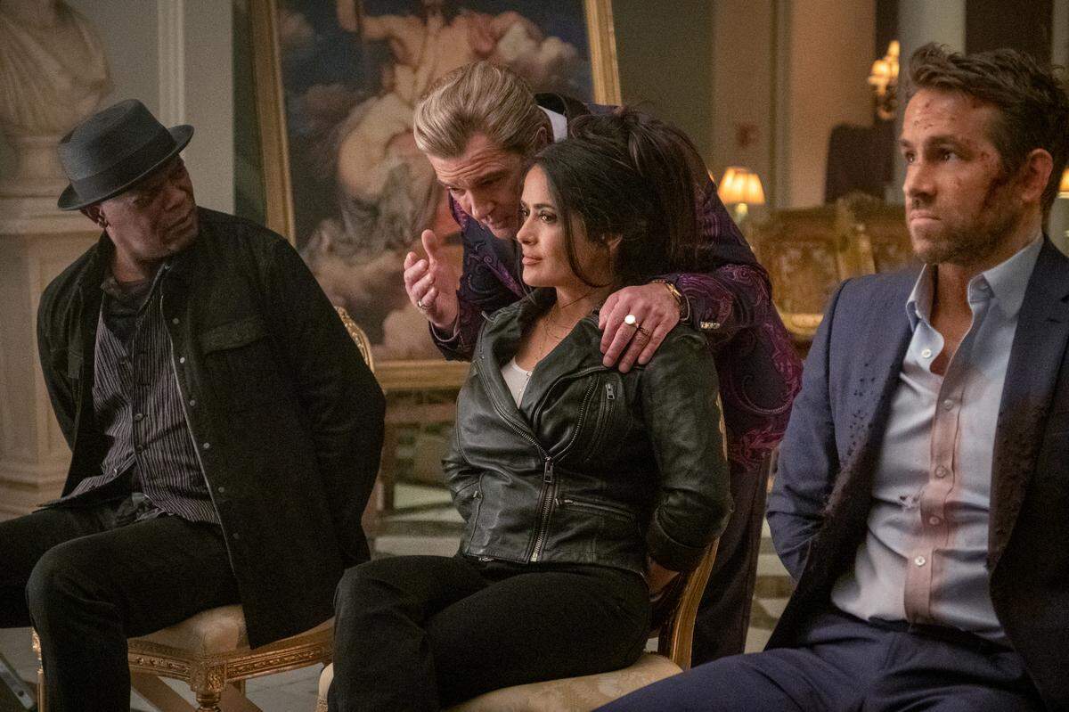 Samuel L. Jackson as ‘Darius Kincaid,’ Antonio Banderas as ‘Aristotle Papadopolous,’ Salma Hayek as ‘Sonia Kincaid,’ and Ryan Reynolds as ‘Michael Bruce’ in “The Hitman’s Wife’s Bodyguard.”