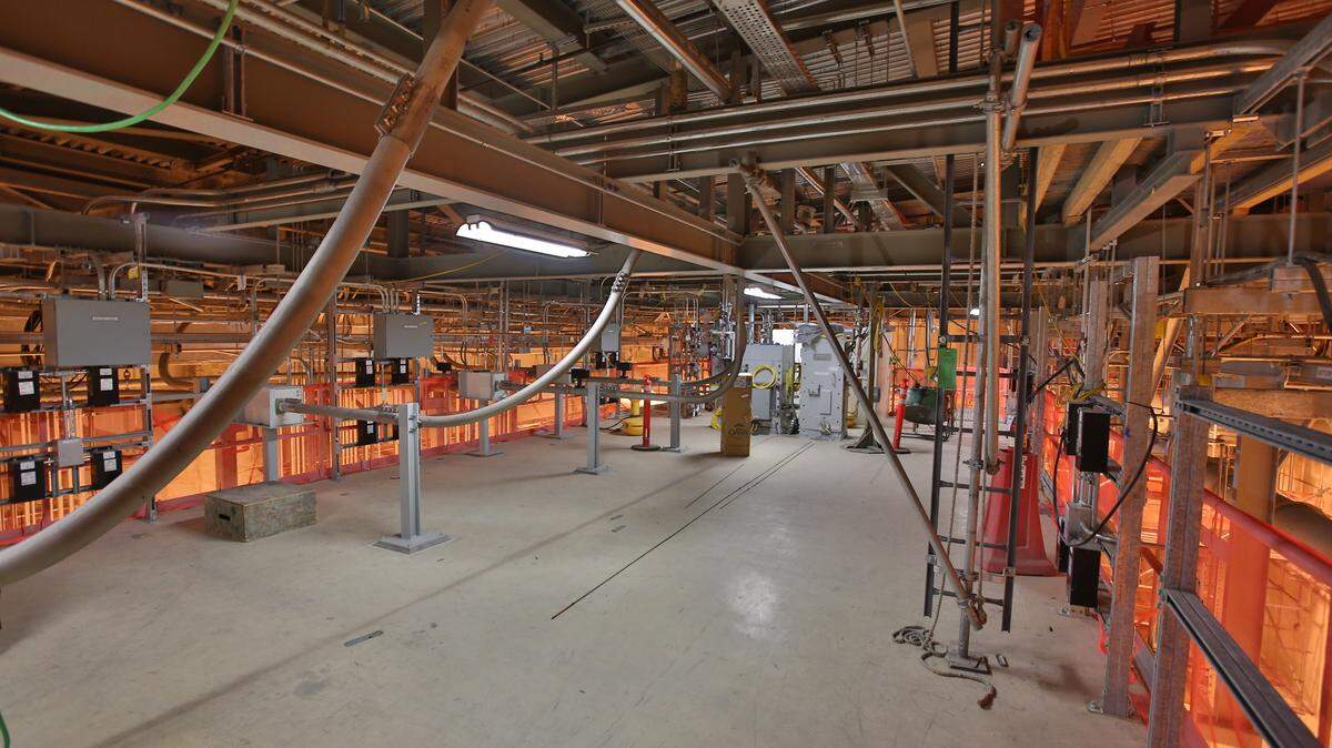 Piping and autosampling equipment are installed above a hot cell in the Analytical Laboratory of the Hanford nuclear reservation’s vitrification plant.