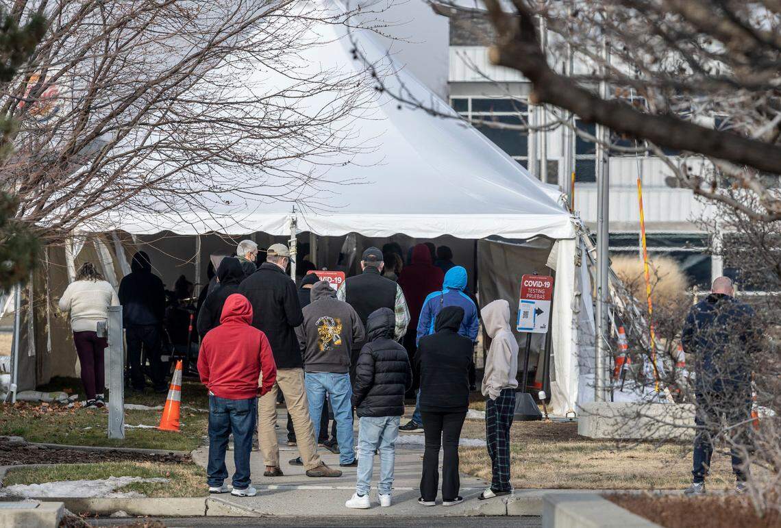 Cars filled the adjacent lot and the line wrapped around to the back of the tent as people waited to get tested at the free COVID-19 testing site off of George Washington Way in Richland this week.
