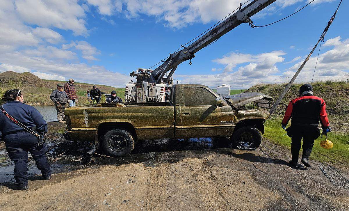 A mid-2000s Dodge Cummins diesel truck was one of three that were pulled from the pond.