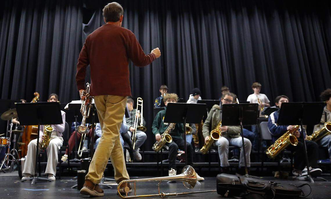 Substitute music teacher Phillip Simpson conducts the seventh-grade jazz band practice at Chief Joseph Middle School in Richland.