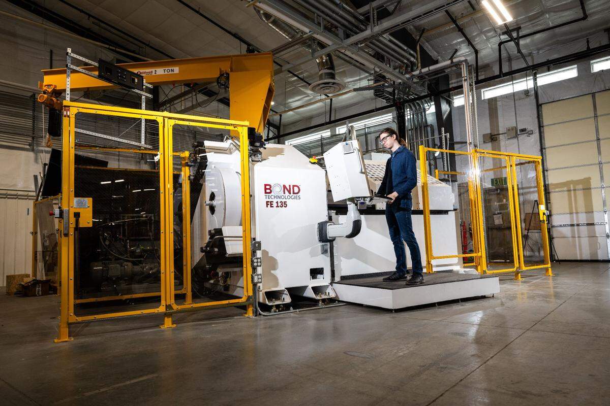 PNNL&nbsp;materials scientist Brian Milligan is among the&nbsp;PNNL&nbsp;researchers using the new Shear Assisted Processing and Extrusion™ machine in their research. Known as ShAPE 2, it is capable of extruded profiles 2 to 3 times larger than the first ShAPE machine and will be used to understand scaling of the ShAPE process.