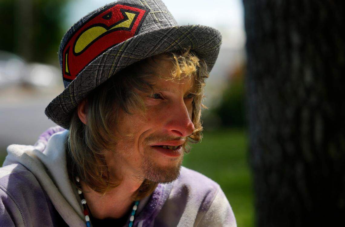 Homeless since he way 16 years-old, Steve-O Wold wears a hat with the Superman logo on it while sitting in a city park off Fruitland Street in Kennewick.