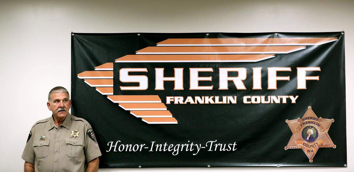 Franklin County Sheriff Jim Raymond prepares to talk with the media and public about the court order to transfer some equipment to the county.