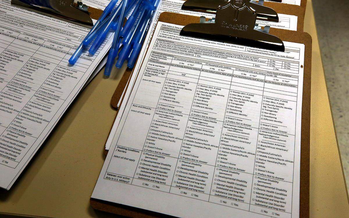Volunteers for the annual Point in Time homeless count carry an optional census form for those people they contact in the field.