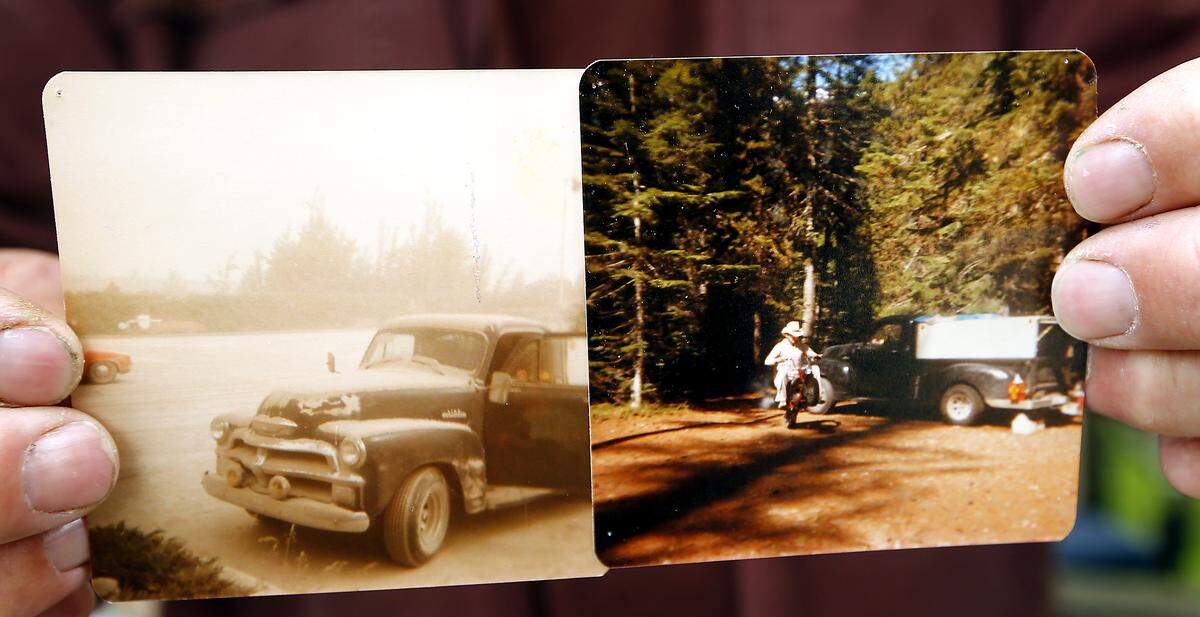 Mike Wingfield holds two photos from May, 1980 showing their 1954 Chevrolet pickup at their campsite near Bumping Lake, right, and their truck covered in volcanic ash in a Yakima motel parking lot the day after Mount St. Helens erupted 40 years ago.