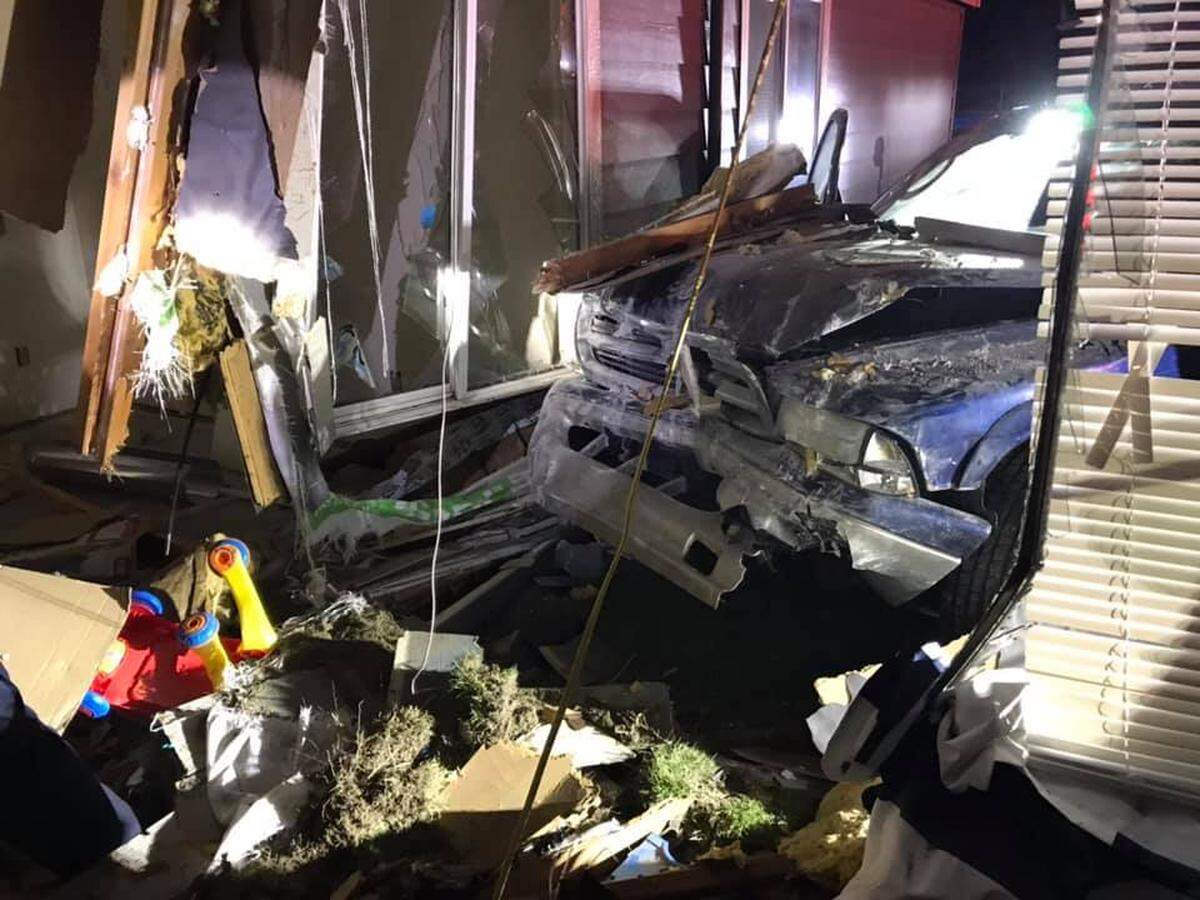 An SUV that police had tried to pull over just minutes before crashed into a Kennewick apartment complex Friday night.