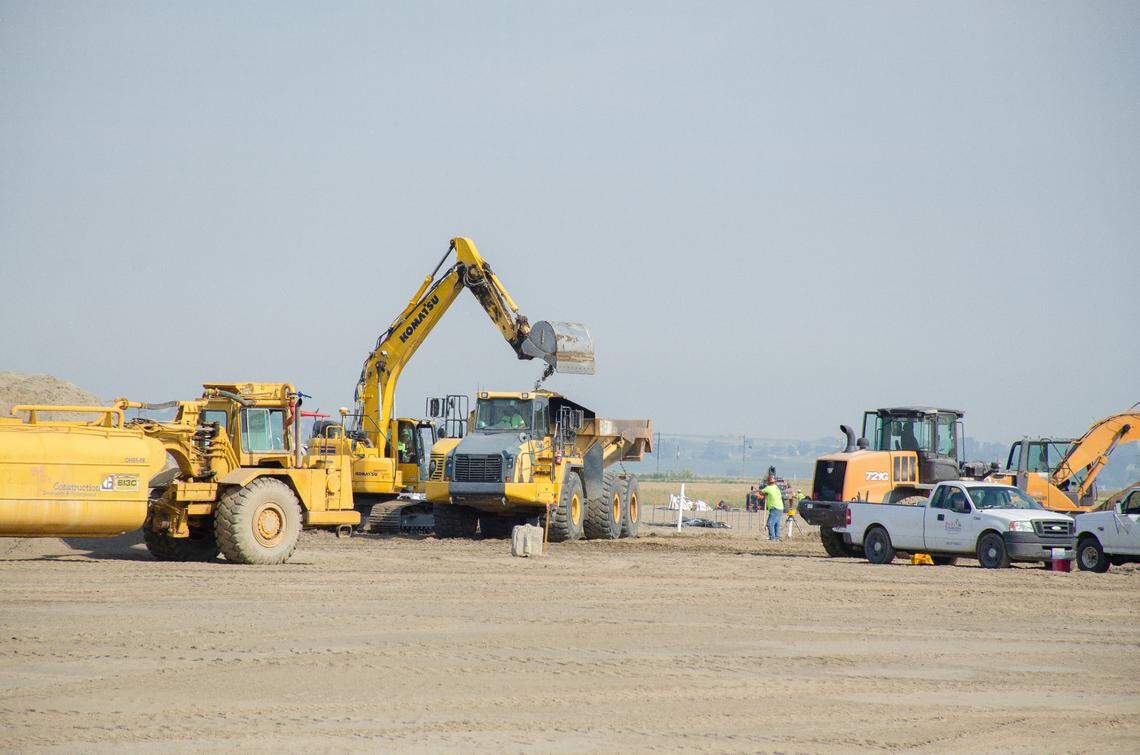 Construction crews were busy doing site work Thursday, Aug. 17, as the Pasco School District met nearby to break ground on the future site of its third comprehensive high school, which will open in fall 2025. 