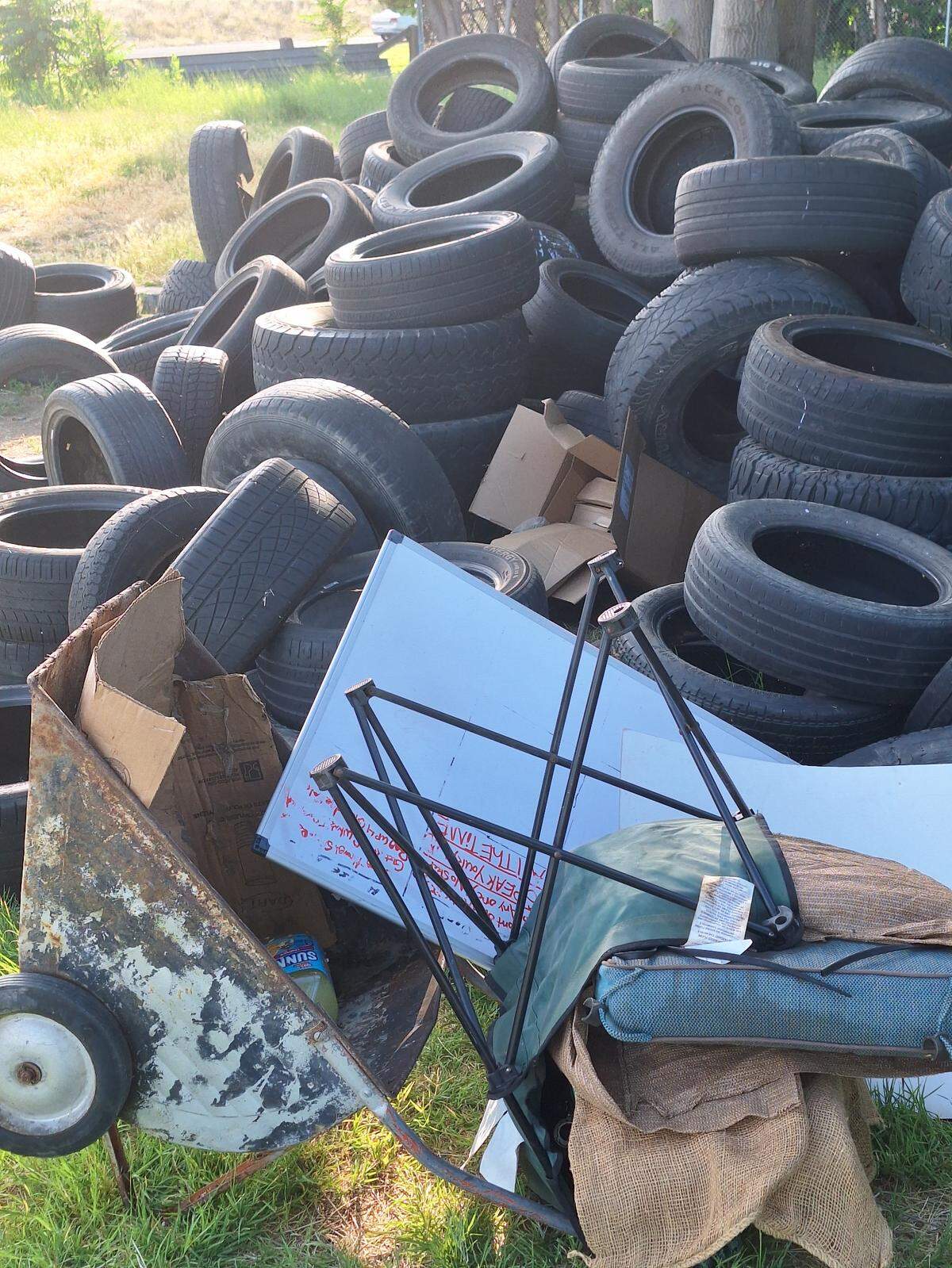 Garbage and debris has accumulated on a Kennewick property where hundreds of tires have been illegally dumped.
