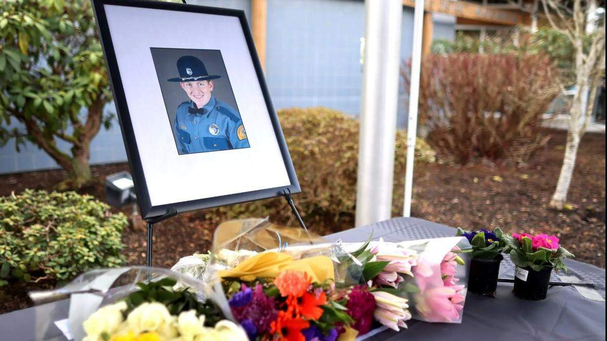 A memorial was set up for Washington State Patrol Trooper Christopher Gadd outside the State Patrol’s District 7 headquarters in Tulalip on Saturday, March 2, 2024. Gadd died after his vehicle was struck by a motorist on I-5.