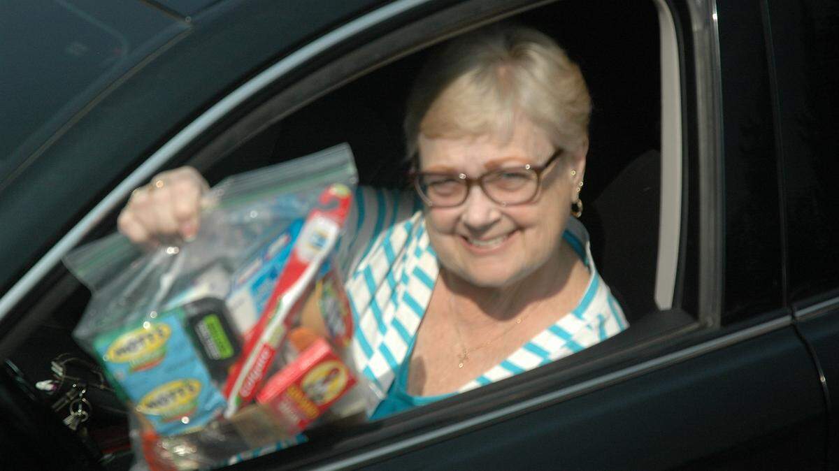 Marijke Cook of Richland offers a blessing bag to panhandlers with the hope it will make a difference in their lives. It contains toiletry items and food.