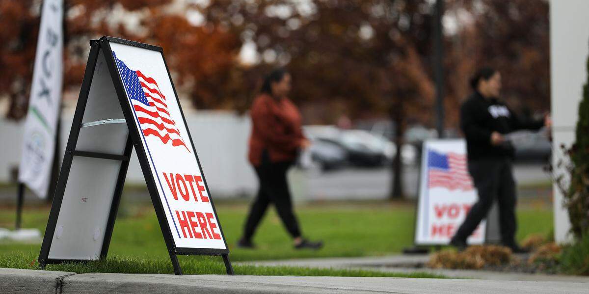 Benton County voters follow the signs outside the Benton County Elections Center to the ballot drop off point accessed from outside the building in Kennewick.