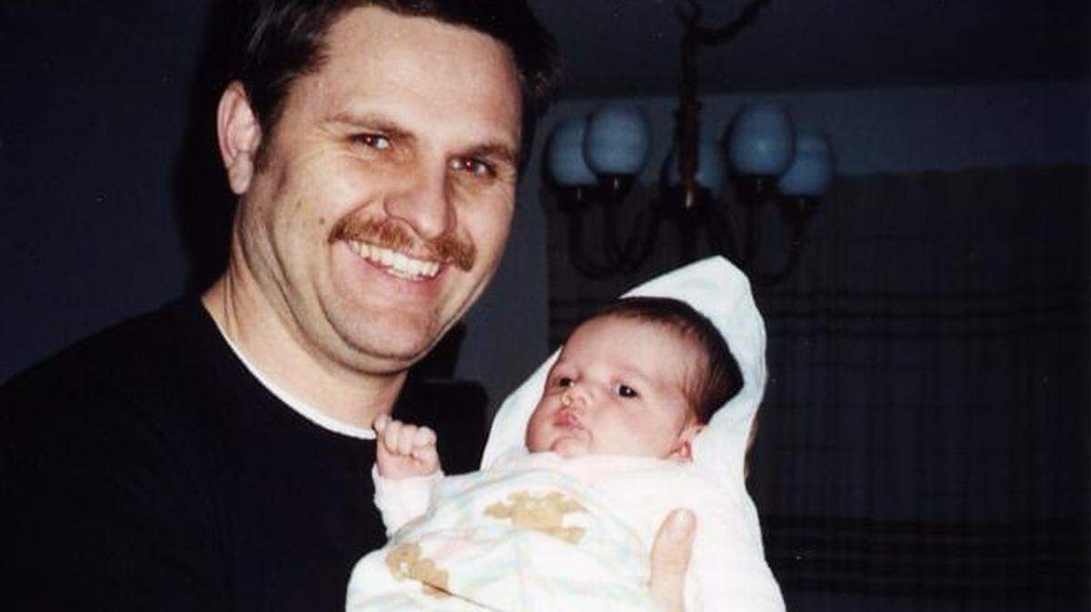 Lee Walter holds Kaylene soon after the adoption.