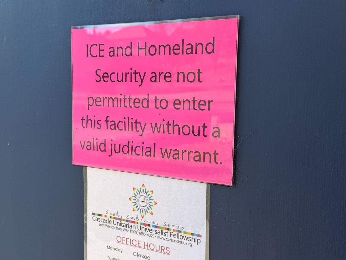 A sign hangs that says “ICE and Homeland Security are not permitted to enter the facility without a valid judicial warrant,” at Cascade Unitarian Universalist Fellowship in East Wenatchee.