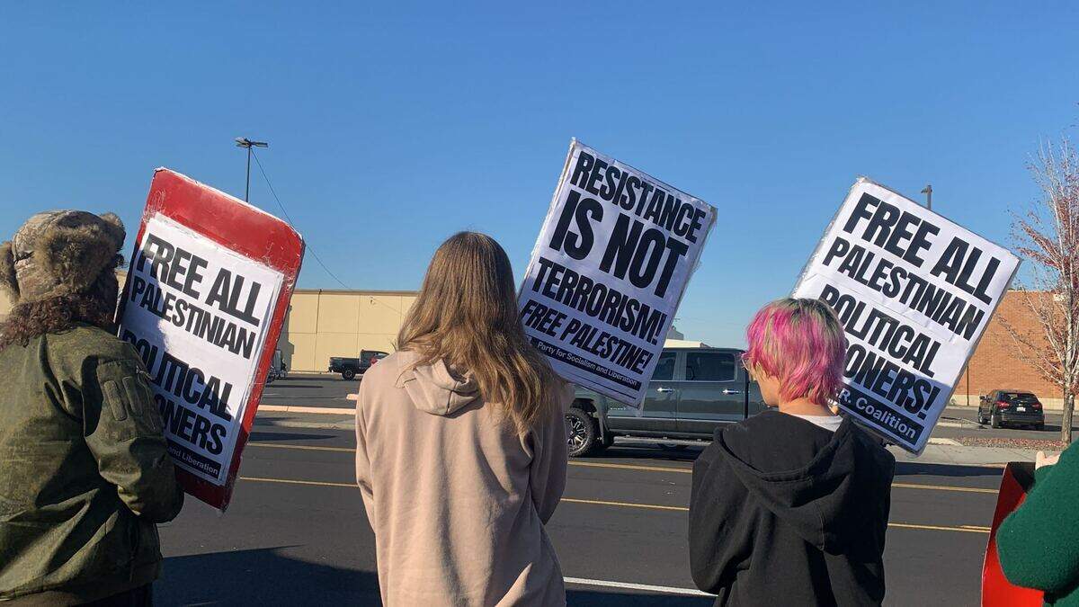 Peaceful protesters in Pasco, WA call for a free Palestine on Oct. 28. Hundreds gathered with signs and chants to protest U.S. support of the Israeli Defense Forces.