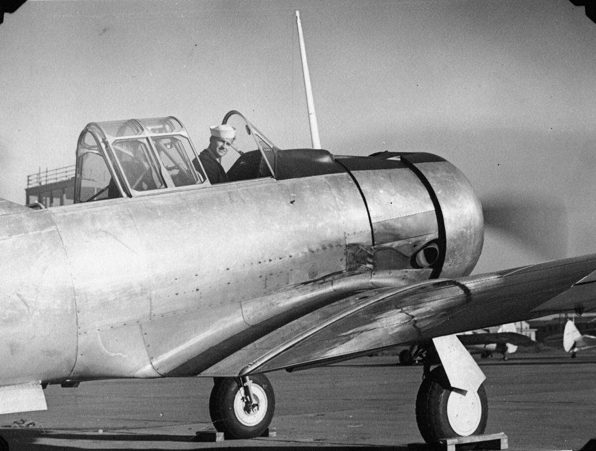 W.L. “Gene” Nelsen in a Navy SNJ Trainer at Pasco Naval Air Station, 1943. Nelsen was an aviation machinist mate and a non-commissioned pilot. After leaving Pasco he served in the South Pacific until the fall 1945.