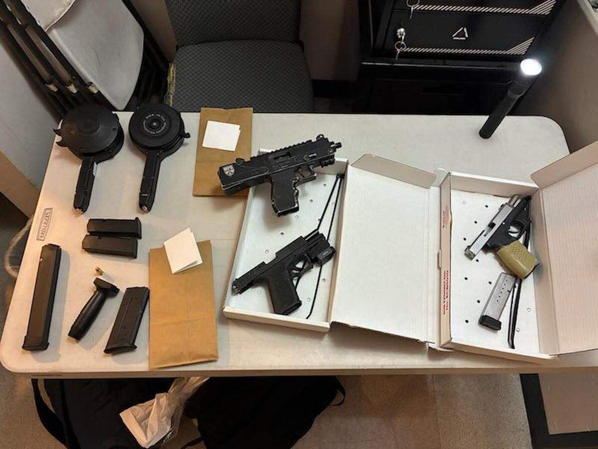 Three guns were seized by police in a house on South Neel Street in Kennewick. 