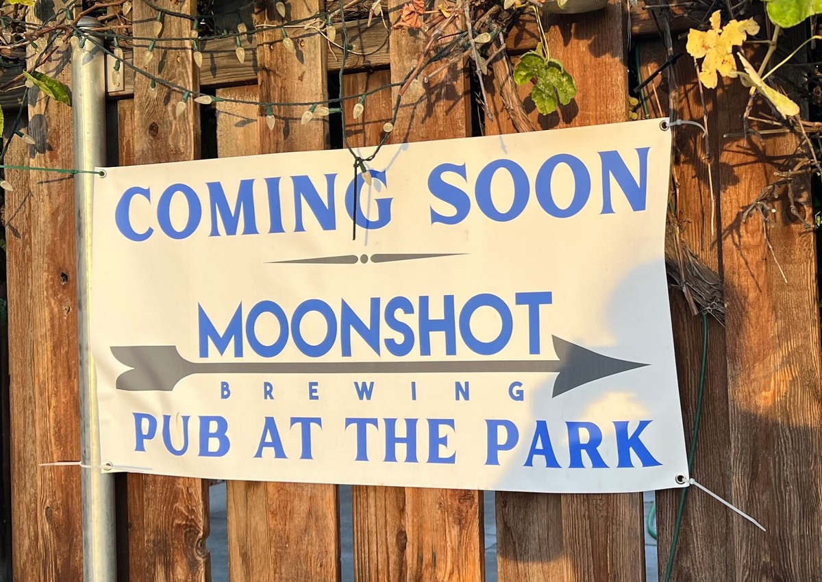 A sign announces the new location of Moonshot Brewing near Howard Amon Park in Richland.