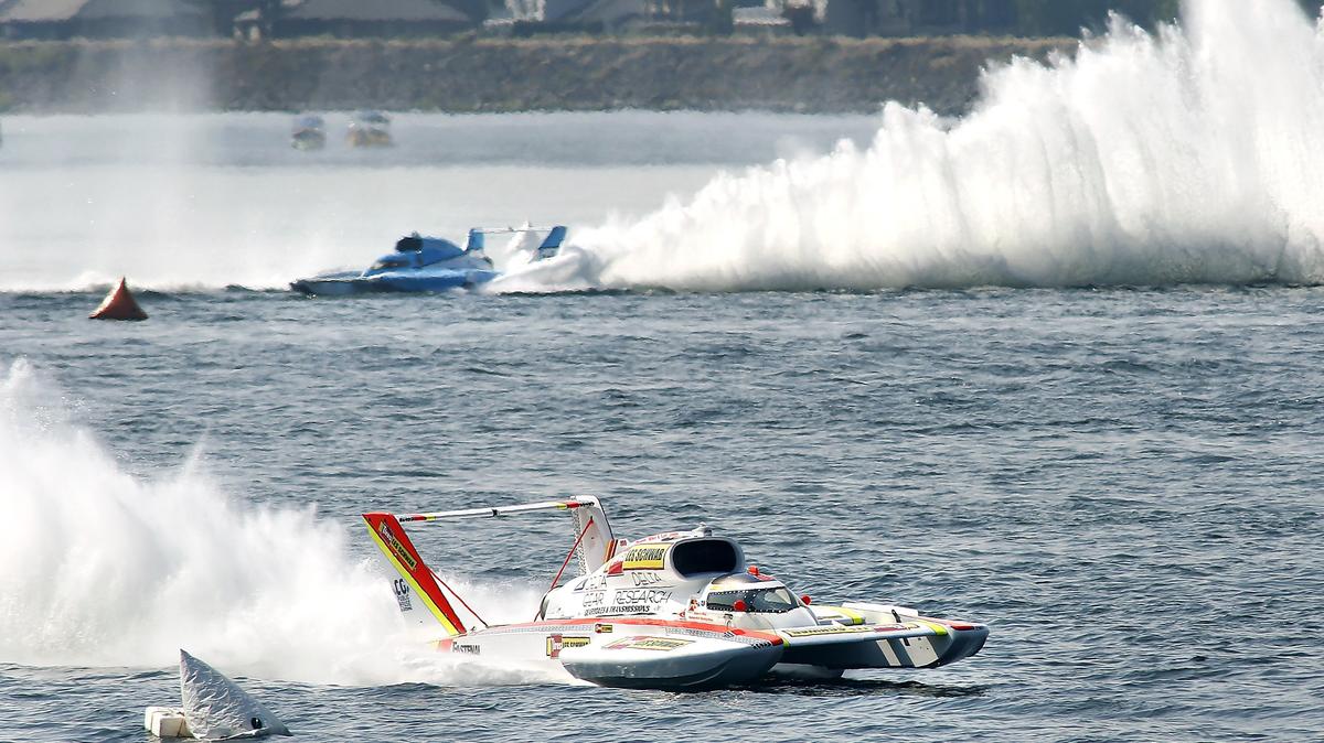 Andrew Tate in the U-9 unlimited hydroplane cruises to victory in the championship race in front of Jimmy Shane in the U-1 Sunday afternoon on the Columbia River.