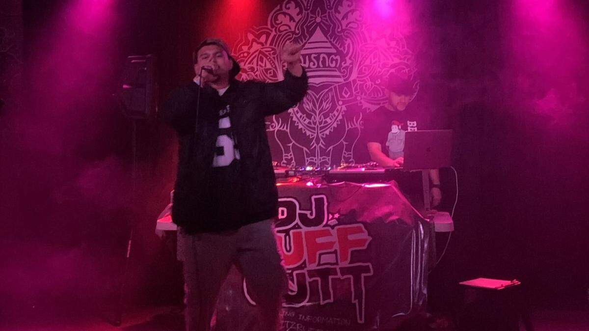 Pasco-based rapper Roque Thekickitmastah onstage at The Emerald of Siam with DJ Ruff Cutt in May 2024 for the first Lyricists Lounge.