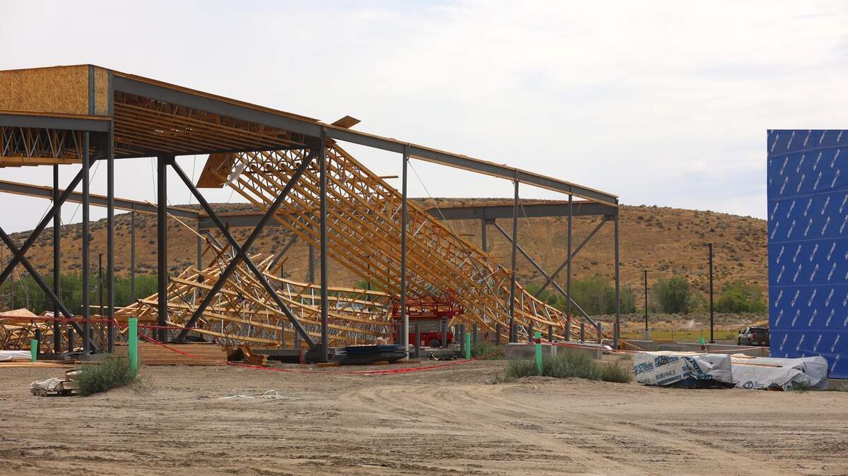 Roof trusses collapse injures two at construction site | Tri-City Herald