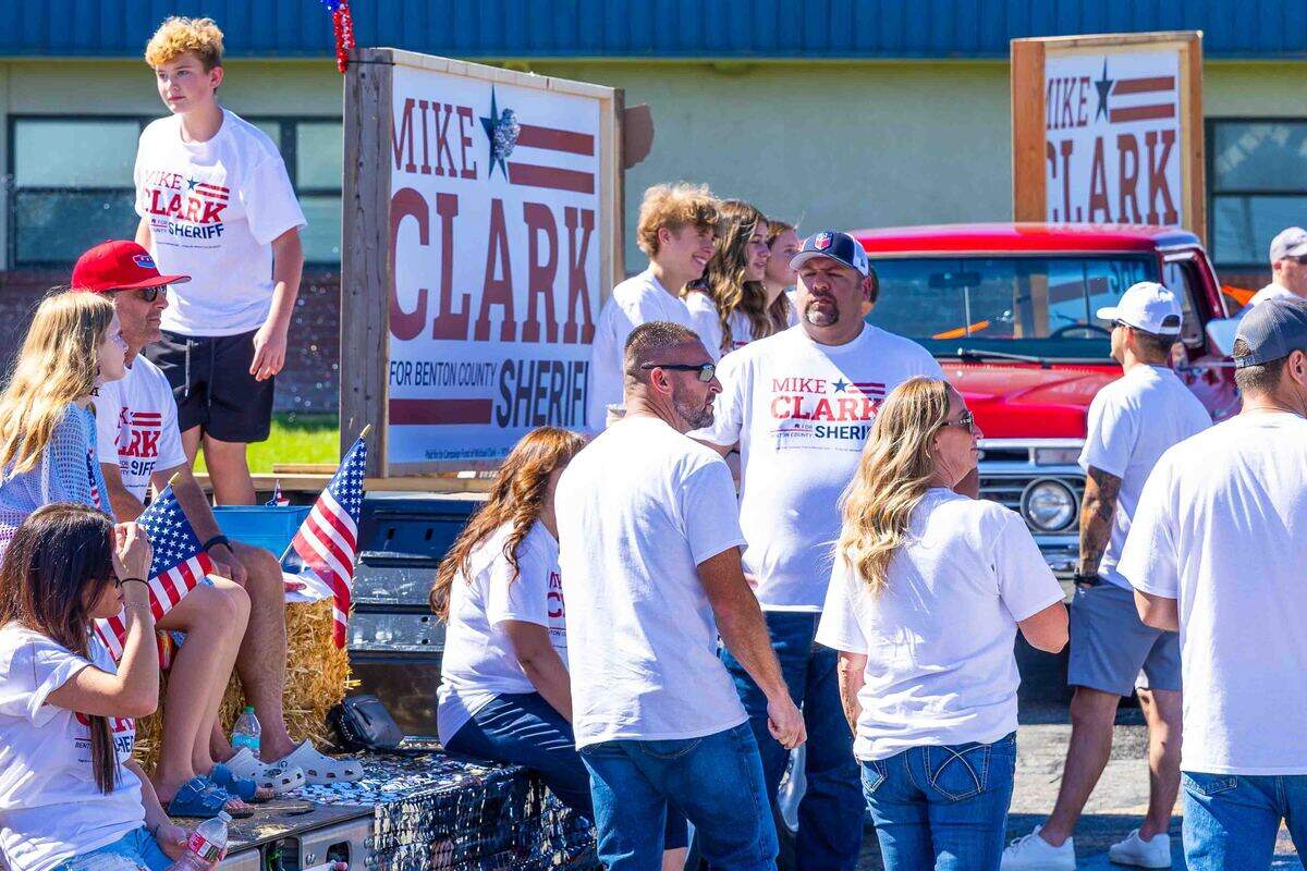 Supporters of Benton County sheriff candidate Mike Clark ride in Saturday’s Benton City Fourth of July Parade along Main Street. The annual celebration also included a community breakfast, a flag-raising ceremony, family activities and an evening fireworks display.