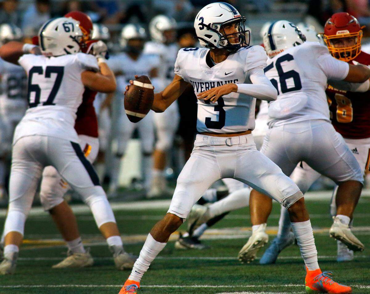 Chiawana’s JP Zamora (3) stands in the pocket preparing to throw a pass during the Sept. 9 game at Lampson Stadium in Kennewick. The Braves won 46-24.