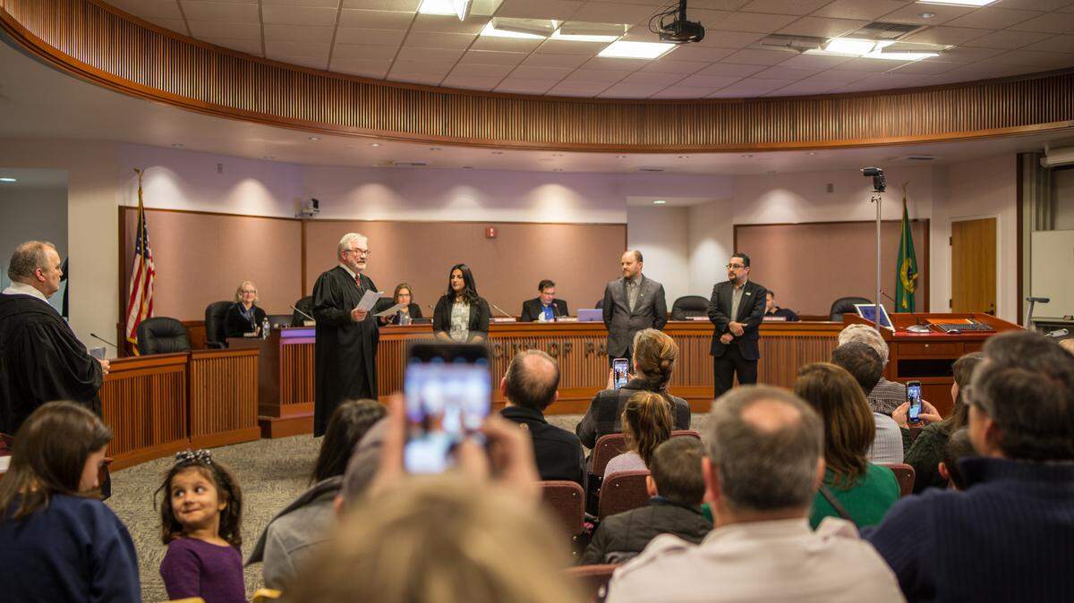 Zahra Roach was sworn in as Pasco’s newest council member on Dec. 9, 2019, by Franklin County District Court Judge Jerry Roach. Councilmen David Milne and Ruben Alvarado were issued the oath of office by Pasco Municipal Court Judge Craig Stilwill, far left.
