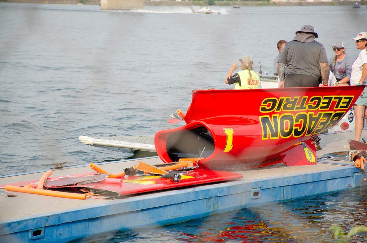 Pieces from the U-1 Beacon Electric hydroplane lie on a dock following a dramatic flip in H1 Unlimited action Saturday, July 27, during the 2024 Water Follies Apollo Columbia Cup and STCU Over-the-River Air Show.