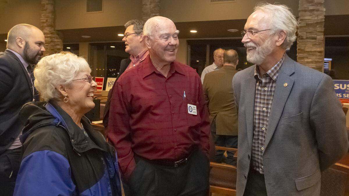 Rennette and Jerry Martin of Kennewick talk with Congressman Dan Newhouse during the Benton County GOP party at Zintel Creek Golf Club in Kennewick on Tuesday night. Newhouse was heading to other election events in Yakima County later in the evening.