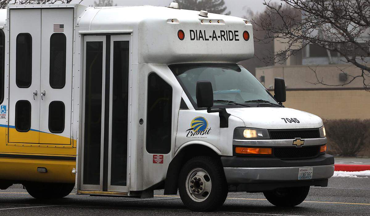 A Ben Franklin Transit Dial-A-Ride sits in the parking lot near the Toyota Center in Kennewick.