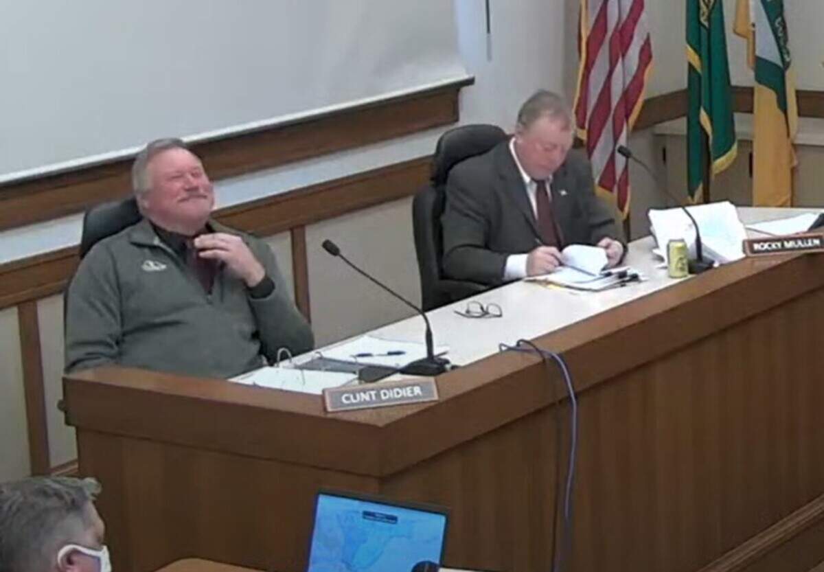 Franklin County Commissioner Clint Didier appears to laugh as a resident calls his earlier comments offensive and racist, during the Dec. 28, 2021 regular meeting.