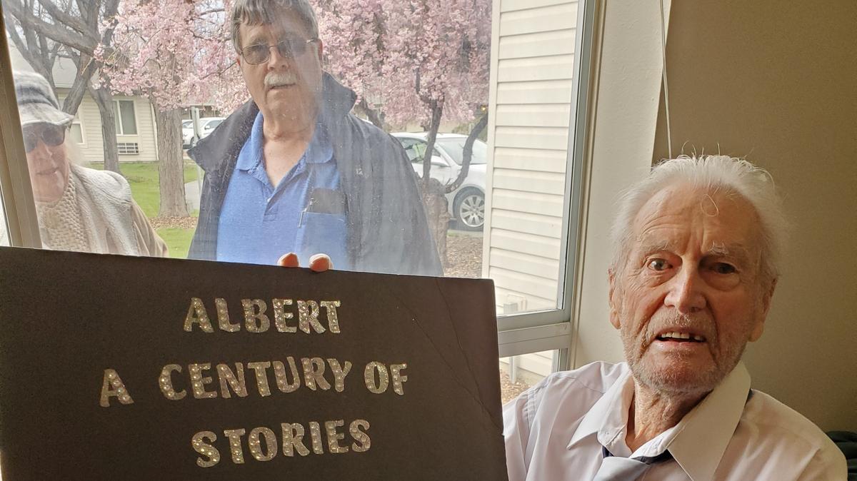 Albert Bushore of Kennewick celebrated his 100th birthday on March 29 as some of his relatives stopped by to visit outside the window of his assisted living room. He died a few weeks later from COVID-19 complications.