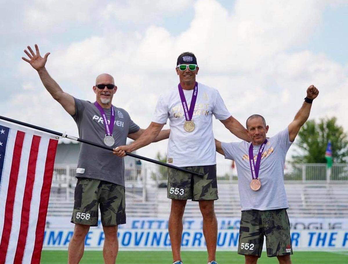 Ken Idler, left, at the Reebok CrossFit games.