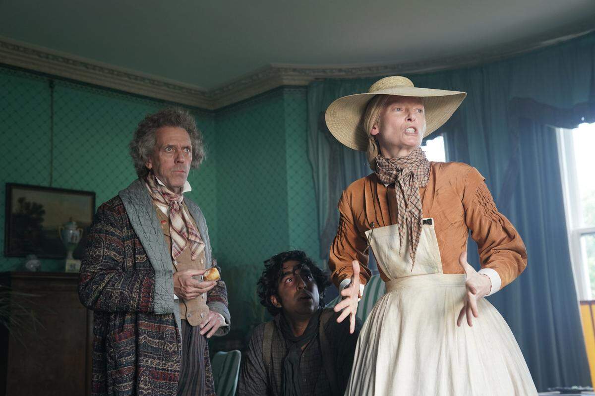 Hugh Laurie, Dev Patel and Tilda Swinton in “The Personal History of David Copperfield.”