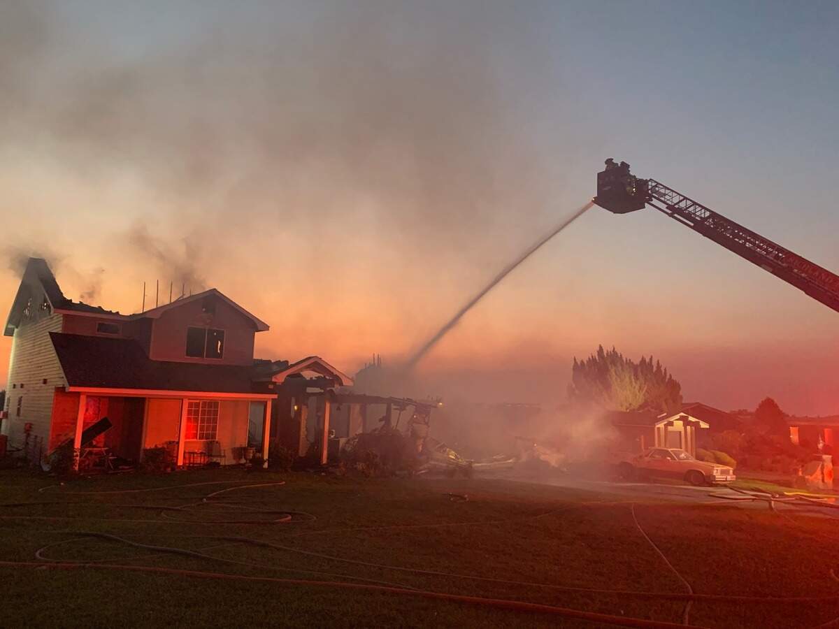 A dramatic fire destroyed a south Richland home on View Drive early Tuesday. The occupant was able to escape because of working smoke alarms.