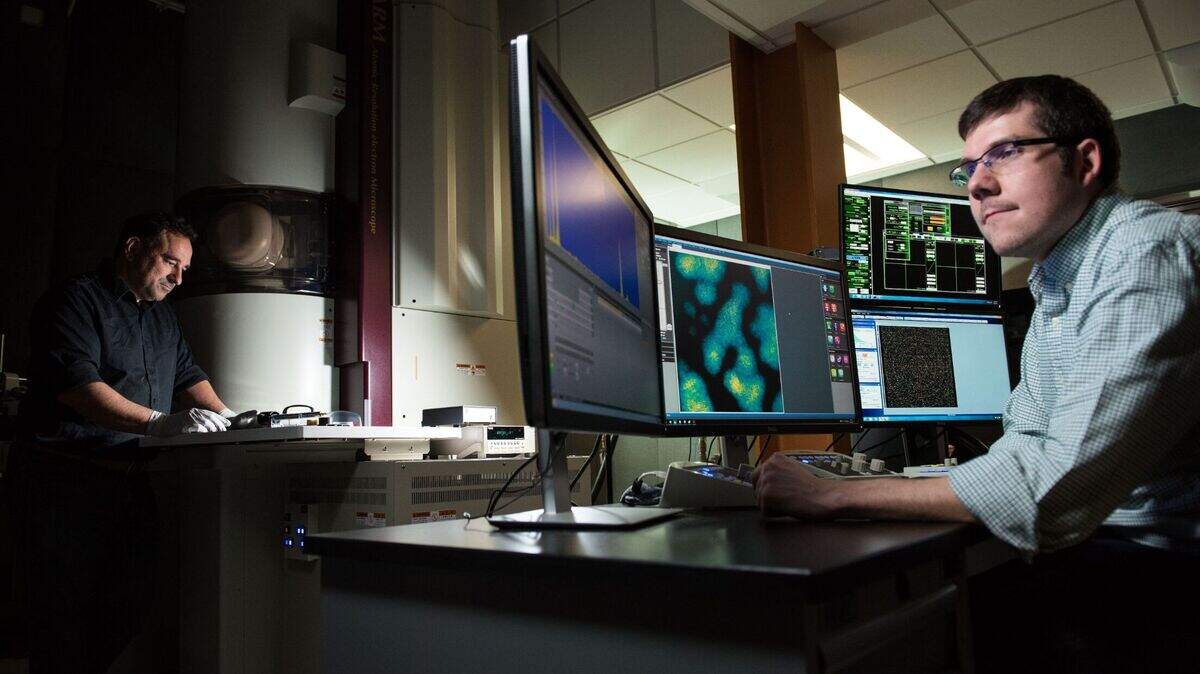 Materials data scientist Steve Spurgeon and his colleagues at PNNL use an artificial intelligence approach known as deep learning to develop models that can quickly and automatically identify patterns in images captured from electron microscopes such as this.