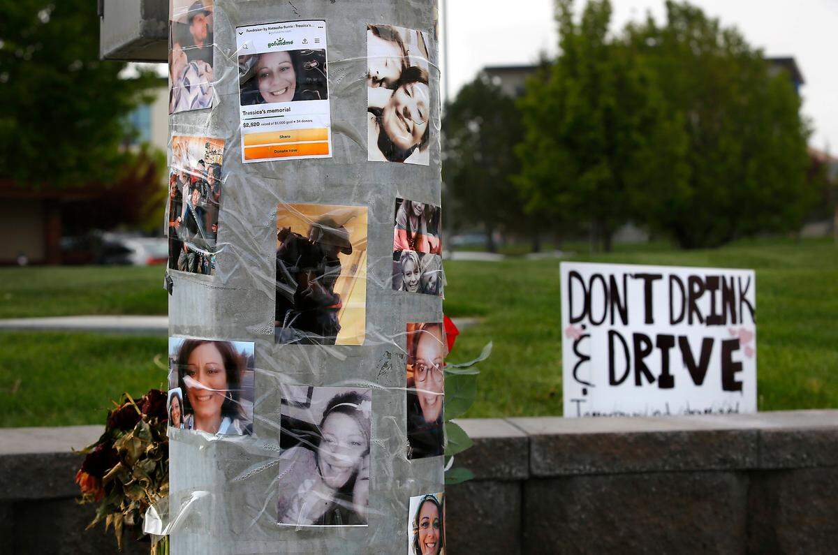 A memorial pays tribute to fatal traffic collision victims Tressica Garza, 38, and Wayne Judd, 45, at the intersection of North Steptoe Street and Gage Boulevard in Kennewick.